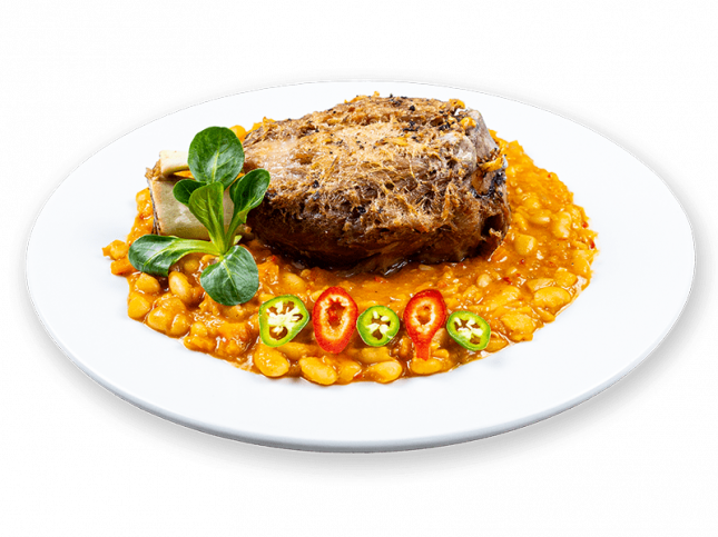 Un jarret de porc fumé aux haricots blancs.